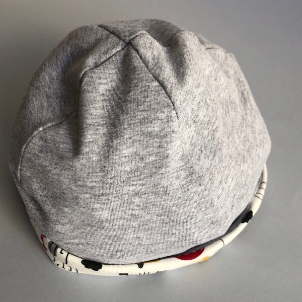 Cappellino reversibile jersey stampa TAXI e jersey grigio melange