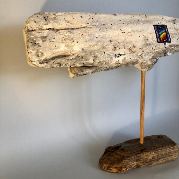 Capodogli sognanti in legno realizzati dall'artista Andrea Agostini per Allover home and lab